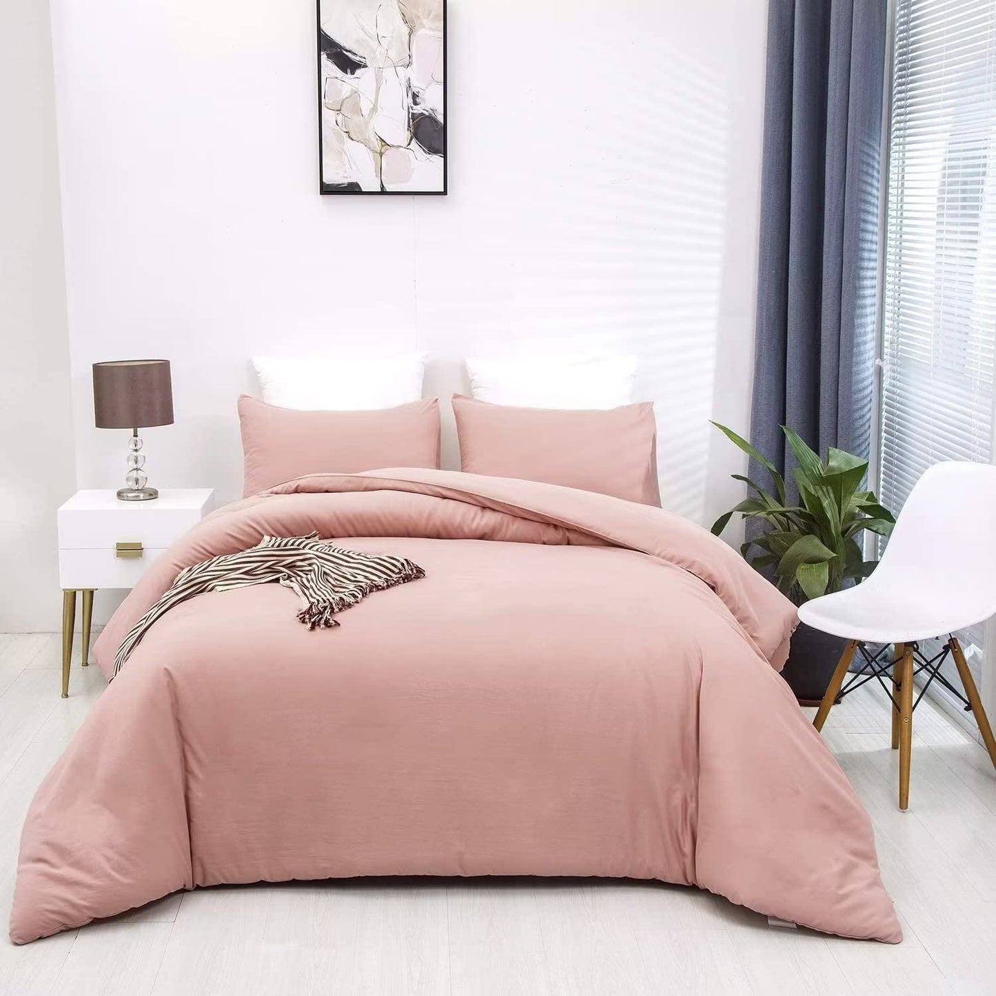 pink cotton bedding set on bed