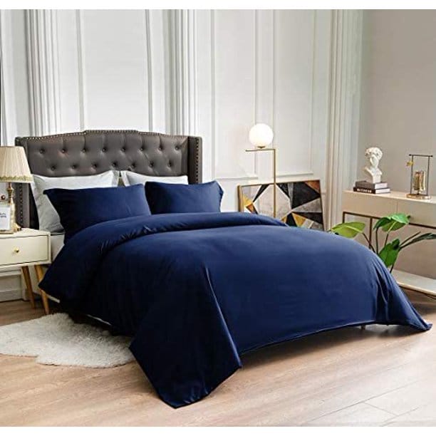 dark blue cotton bedding set king size on bed