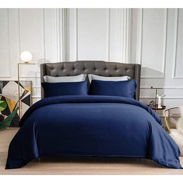 dark blue cotton bedding set king size on bed