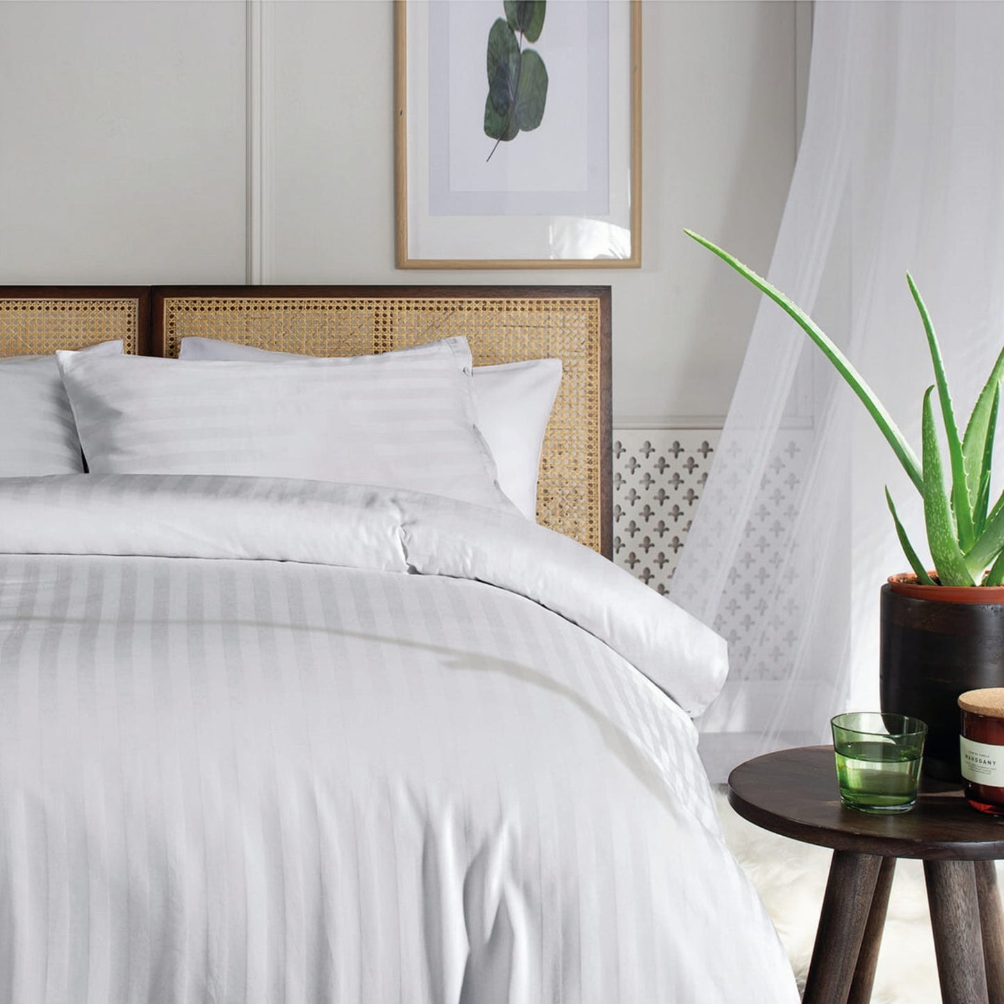 white bedding set with stripes king size on bed
