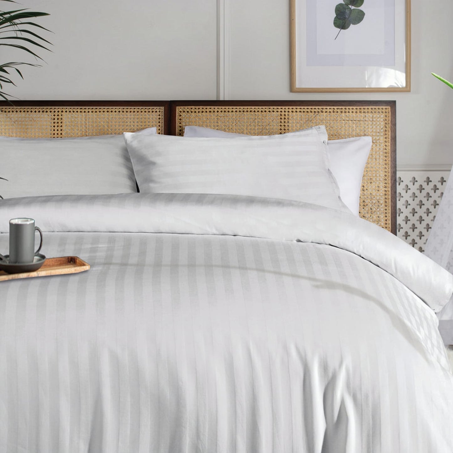 white bedding set with stripes king size on bed