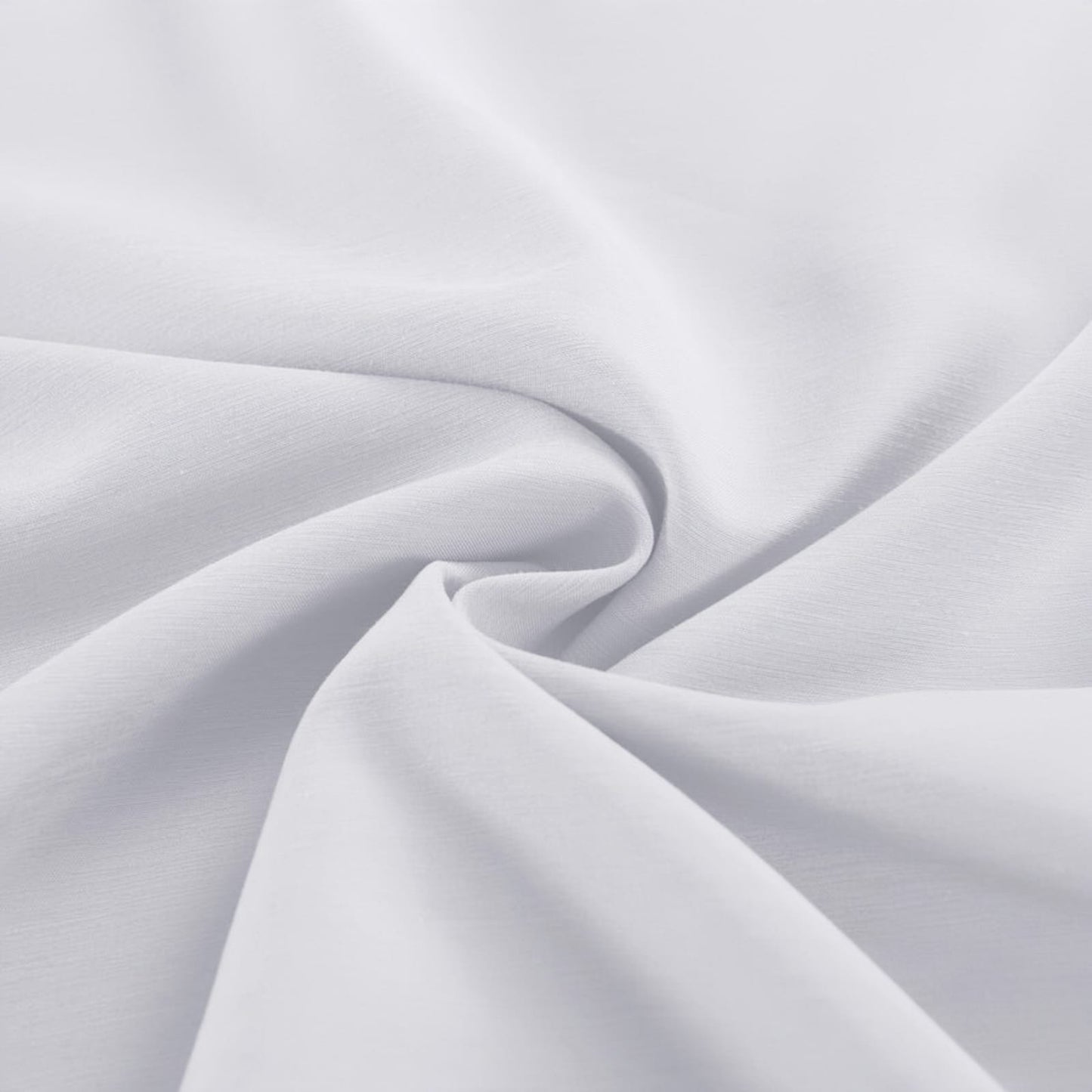 white cotton bedding material