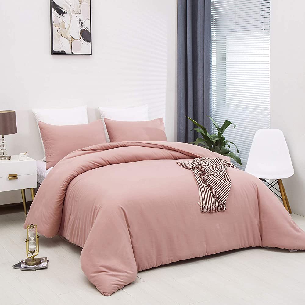 pink cotton bedding set on bed
