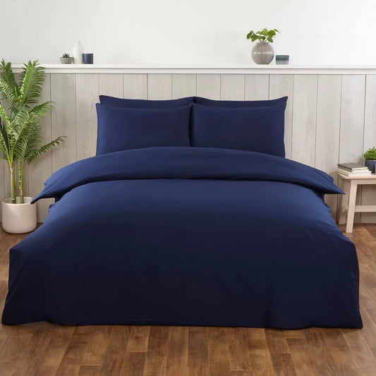 dark blue cotton bedding set king size on bed