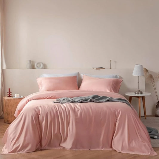 peachy pink bedding set king size on bed